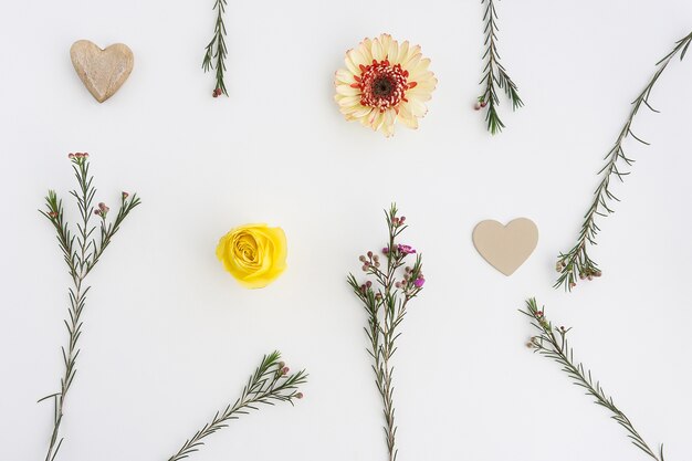 Floral background with hearts and yellow flower