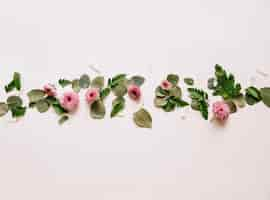 Free photo floral background with leaves in middle