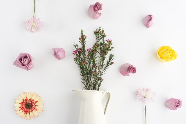 Floral composition with white vase