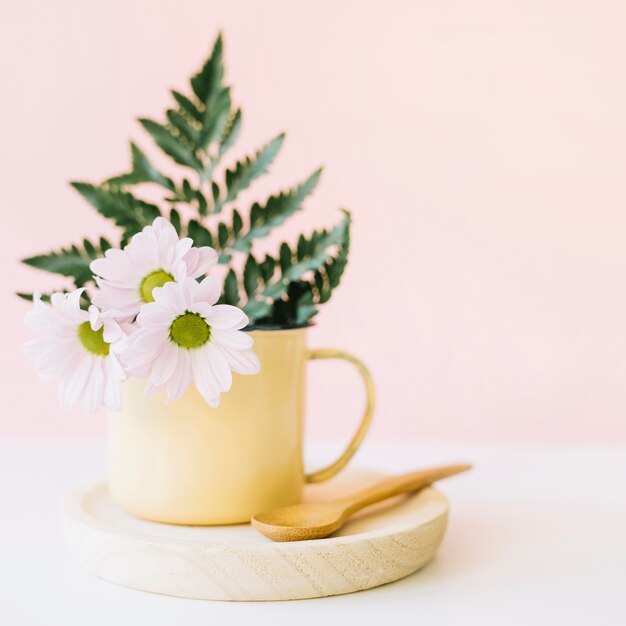 Floral composition on wooden plate