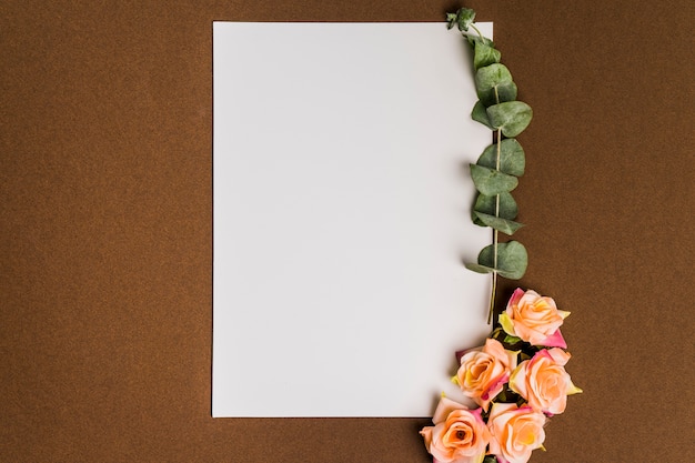 Floral decoration with sheet of paper and leaves