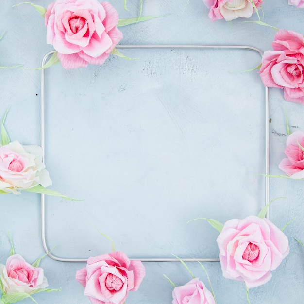 Floral frame with square on cement background