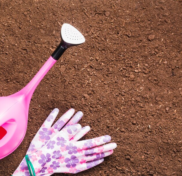 Floral gloves and watering can