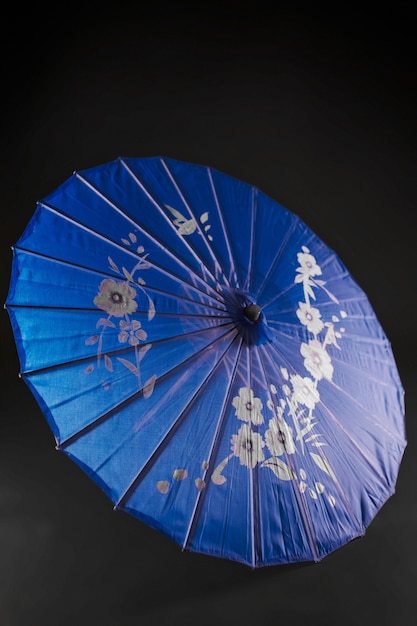 Free photo floral wagasa umbrella in studio