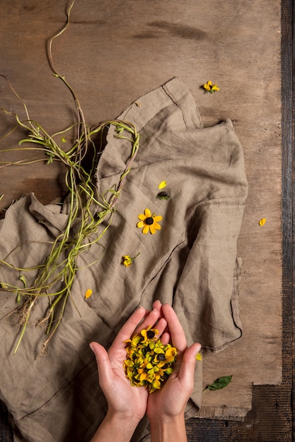 The florist desktop with working tools and ribbons