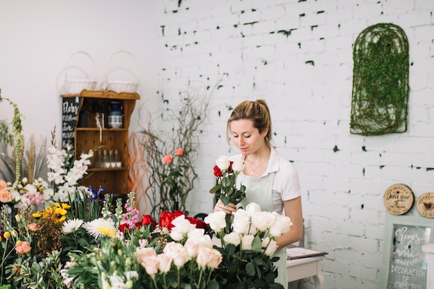 Florist smelling bouquet