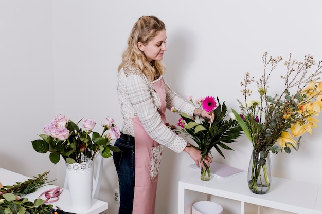 Florist working with plants