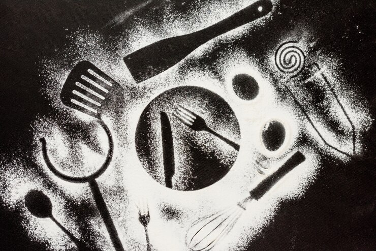 Free Photo flour on black background with shapes of kitchen elements