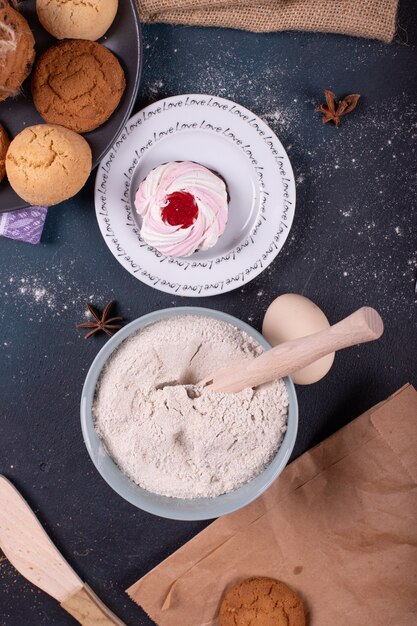 Flour and plate with cake