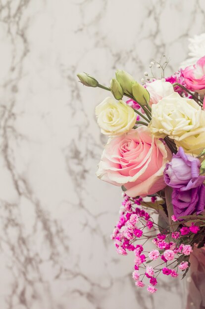 Flower bouquet against marble textured background