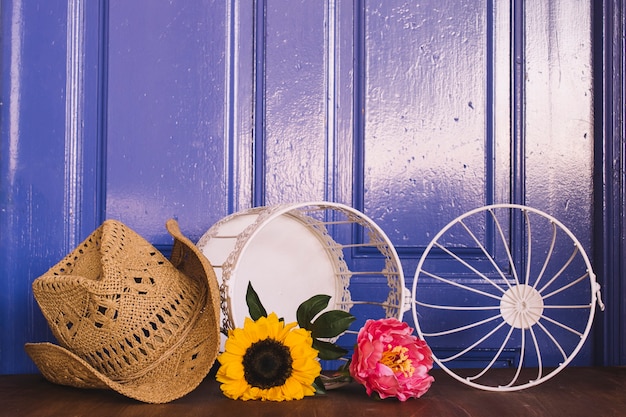 Free photo flower composition with hat