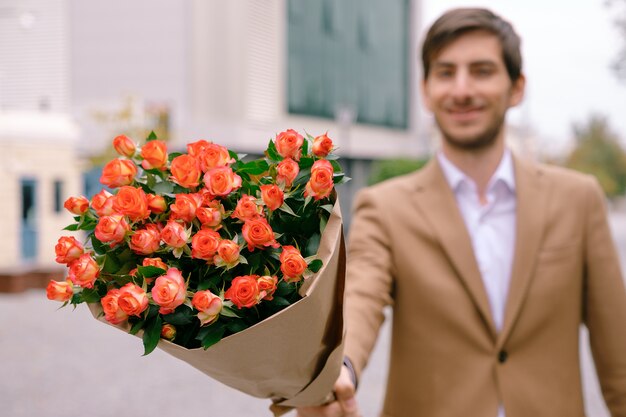 Flower delivery concept. Focus on bouquet of flowers