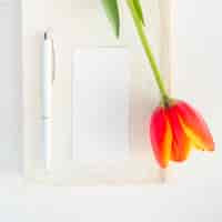 Free photo flower on envelope with pen