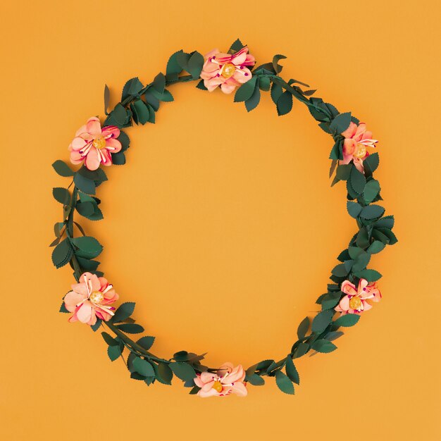 Flower frame over an orange 