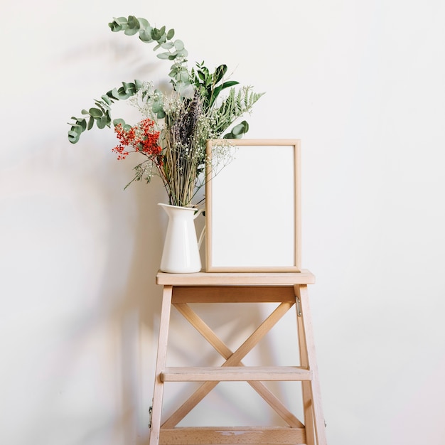 Flower and frame on stool