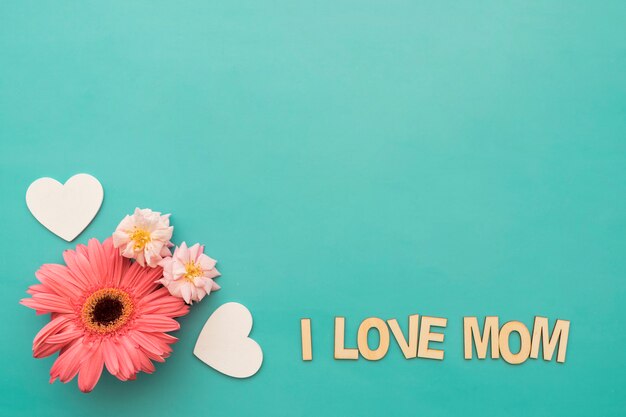 Flower, hearts and "i love mom" lettering