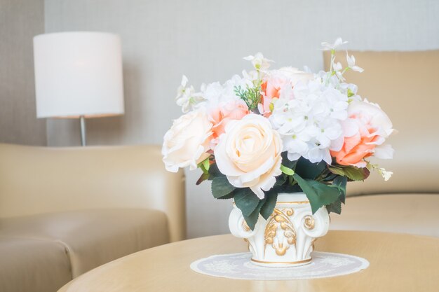 Flower vase on table decoration in living room area interior