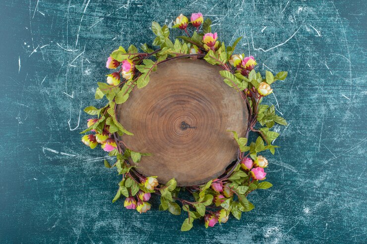 Free Photo flowers around the board , on the blue background. high quality photo