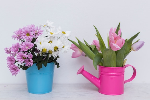 Flowers in basket and pot