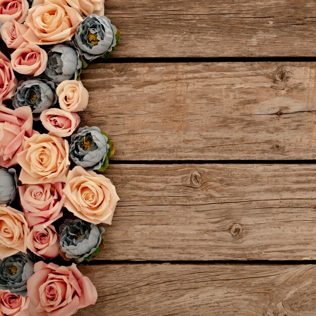 flowers on brown wooden background