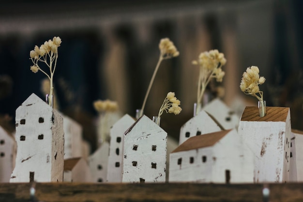 Flowers in house shaped vases