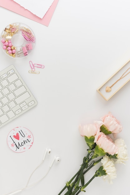 Flowers and necklace copy space