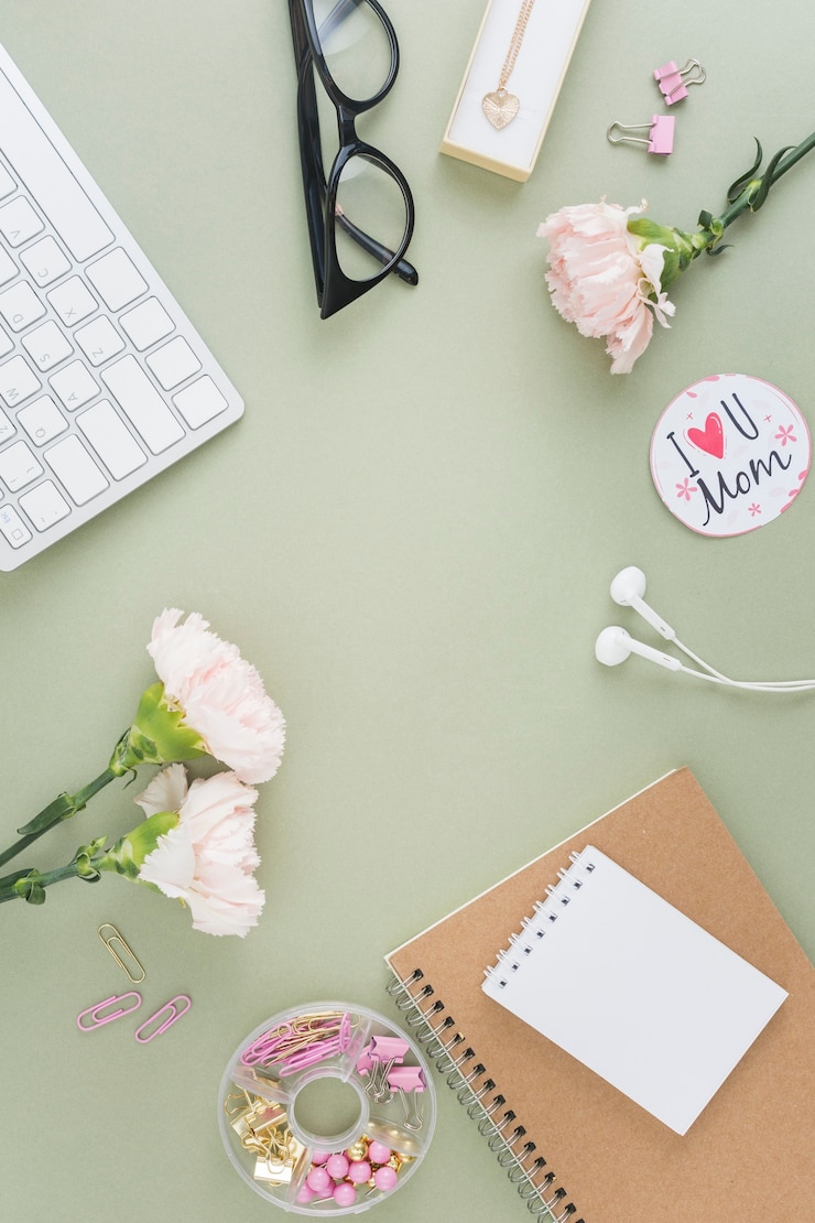 Free Photo flowers and notebooks flat lay
