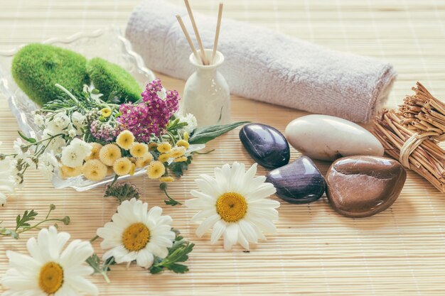 Flowers, vase and stones