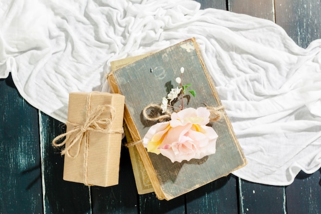 Free photo flowers with empty vintage notebook for your design