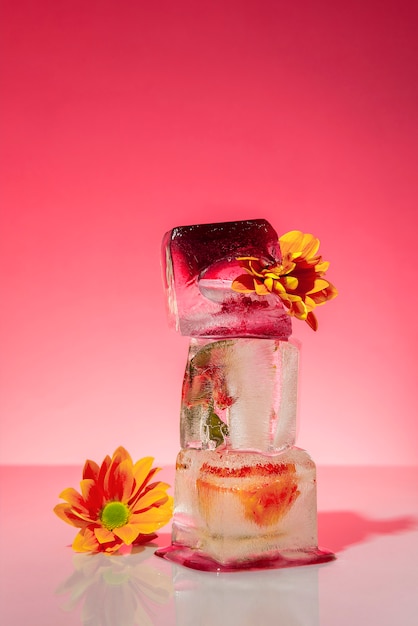 Free photo flowers with ice cubes and ink