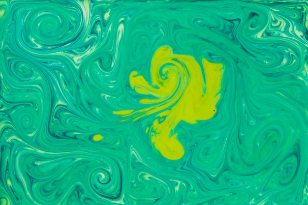 Free photo fluid painting abstract green paint texture art