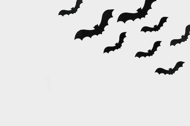Free Photo flying bats cut out of paper 