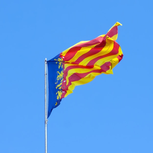 Free photo flying flag of the valencian community