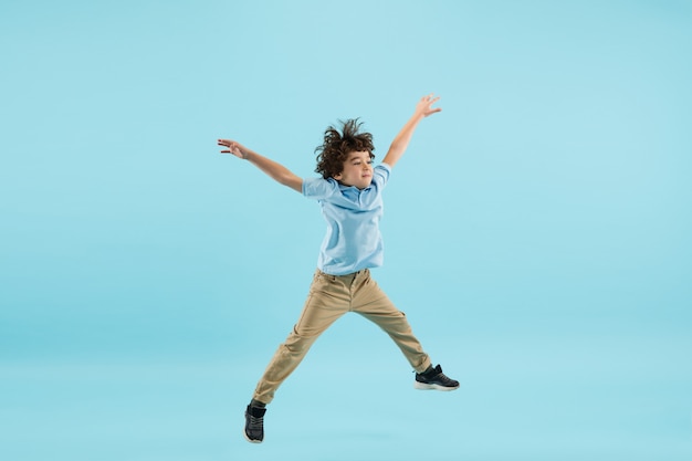 Flying, jumping high. childhood and dream about big and famous future. Free Photo