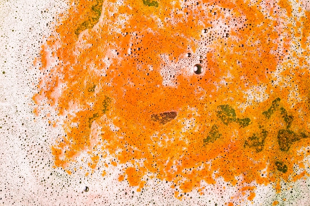 Foam after dissolving color bath bomb in water