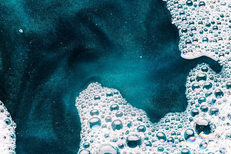 Free Photo foam and azure paint on water