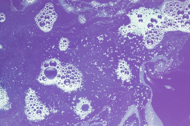 Foam on violet water