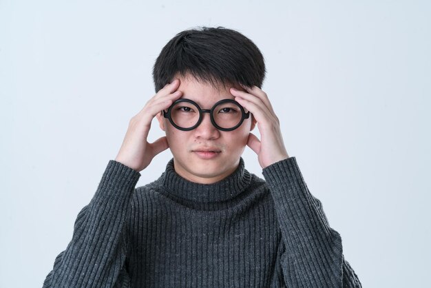 Focus concentrate asian male white background