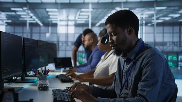 Focus on server hub employee developing disaster recovery plans