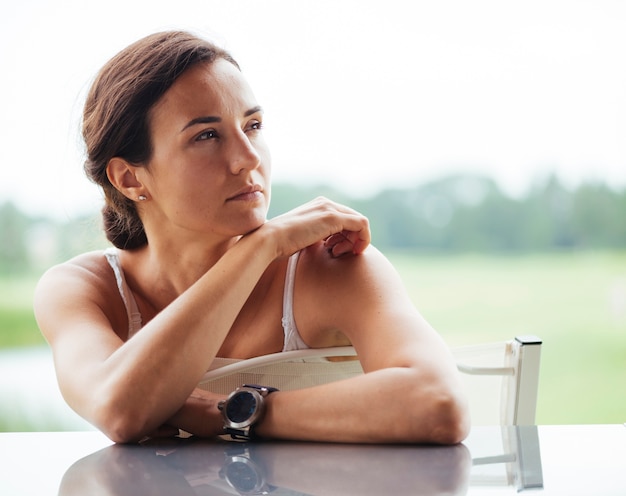 Focused woman looking away with blurred background