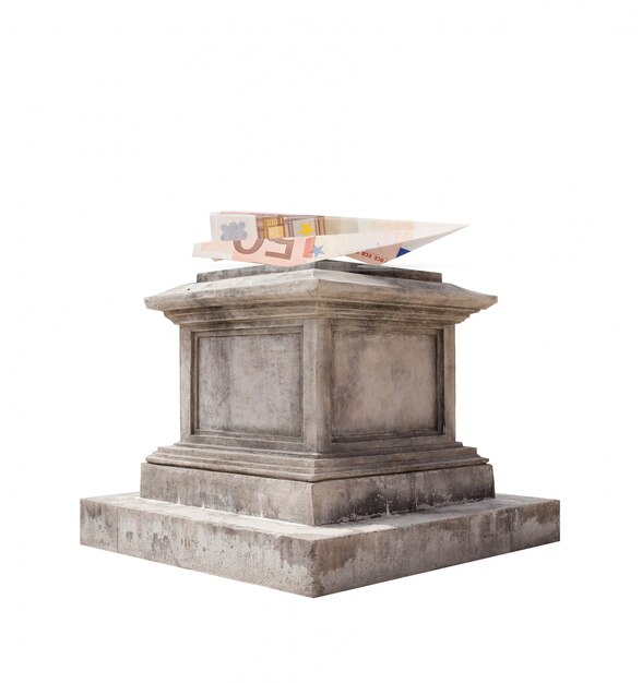 Folded banknote on a marble pedestal