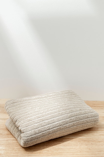 Сложенное полотенце из натурального хлопка
