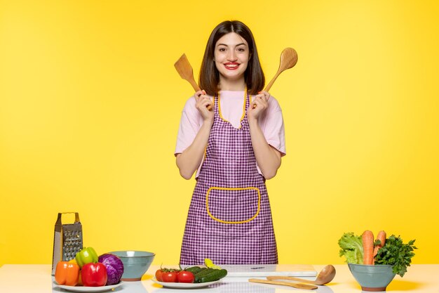 Food blogger healthy fitness chef recording video for social media with wooden spoons