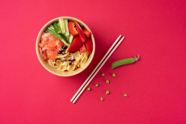 Food bowl and chopsticks top view