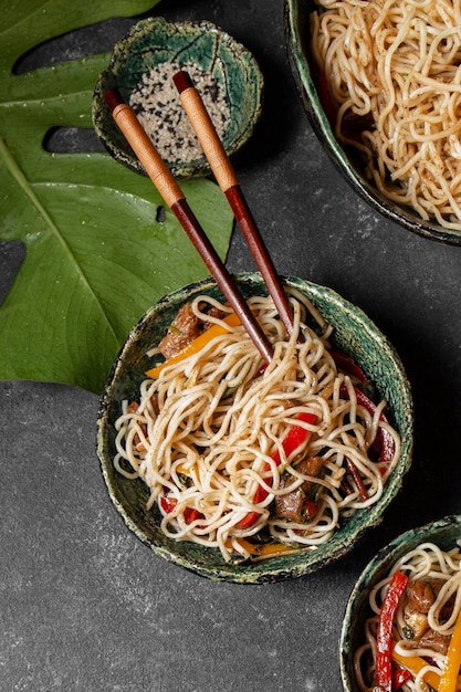 Food bowl with sticks flat lay