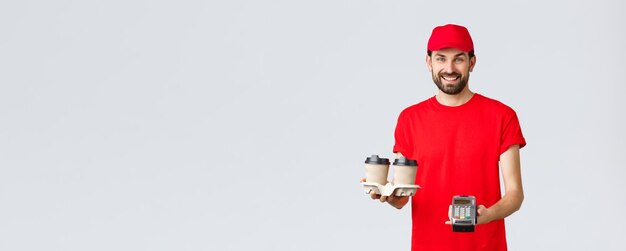 Food delivery quarantine stay home and order online concept friendly bearded courier in red uniform