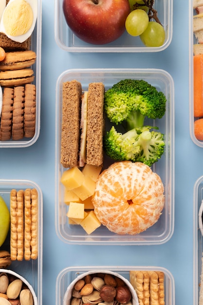 Food lunch boxes arrangement above view