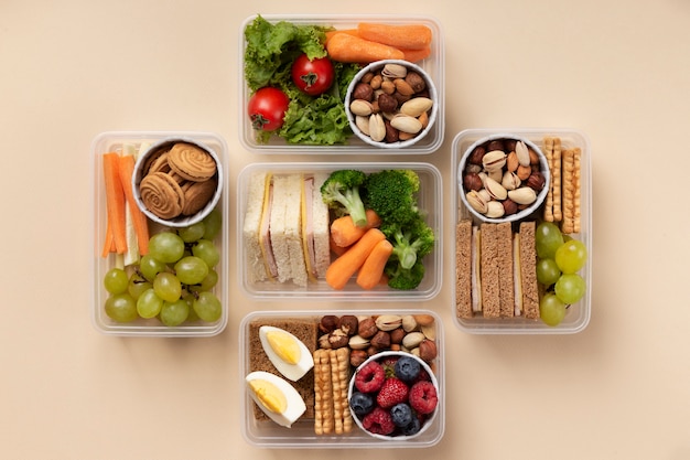 Food lunch boxes assortment flat lay