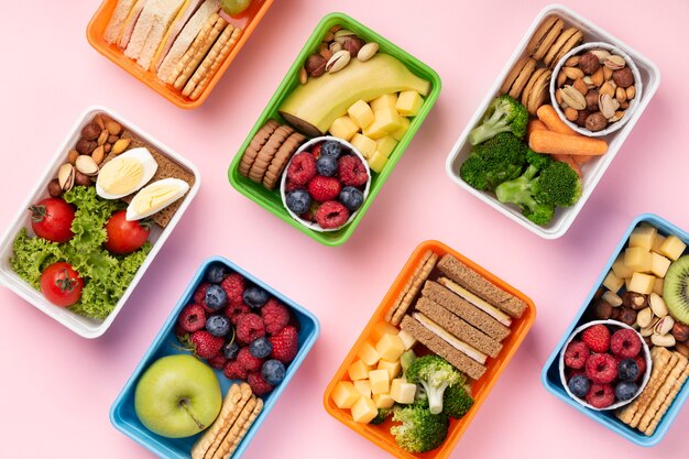 Food lunch boxes assortment above view