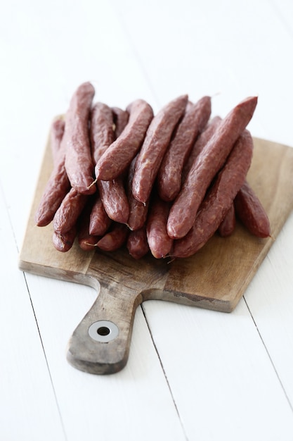 Food, meat. Delicious sausage on the table